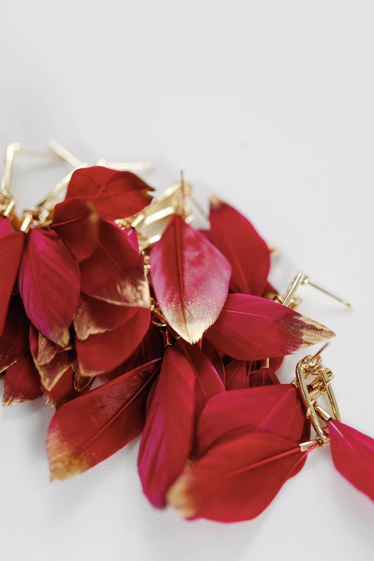 Garnet Gold Dipped Fall Feather Statement Earrings